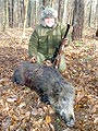 hunter with wild boar